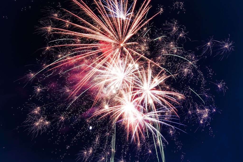 Colorful fireworks exploding in the night sky creating a festive atmosphere Roanoke Va