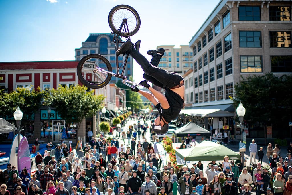 Guy does flip on bike at Roanoke's GO Outside Festival
